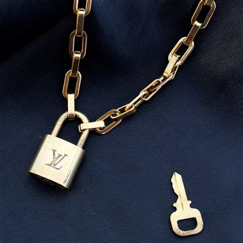 louis vuitton lock necklace dupe|louis vuitton plane necklace.